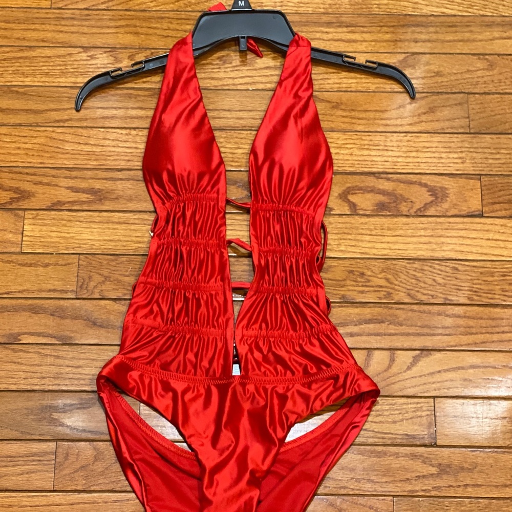 Stylish Swimwear Red low plunge swimsuit.